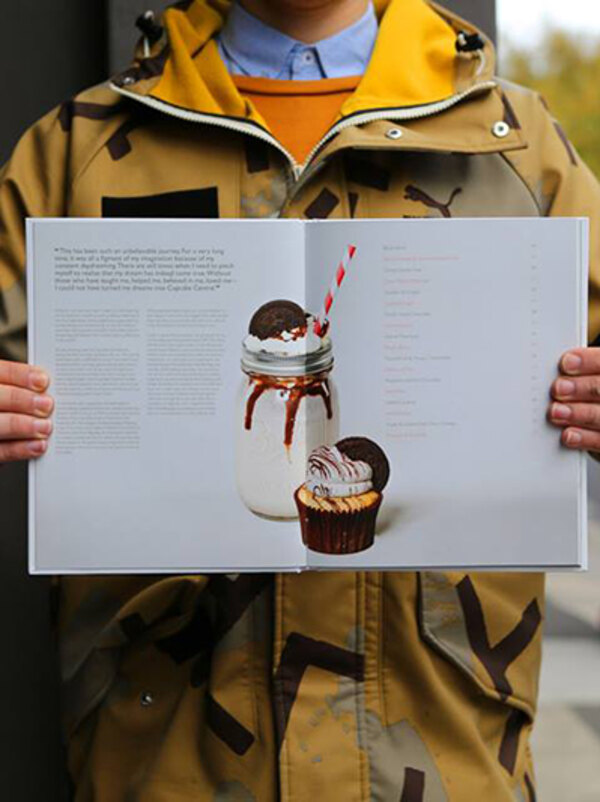 The Cupcake Central book held open